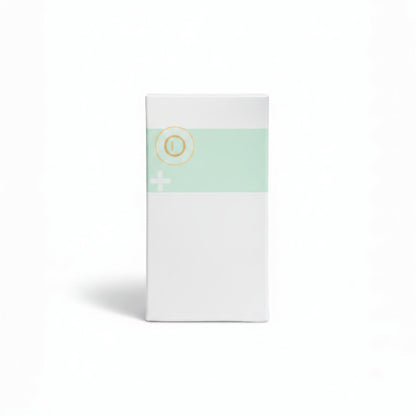Modugreen Baby Lullaby Earth Healthy Support crib mattress in white with a mint green accent band and gold logo.