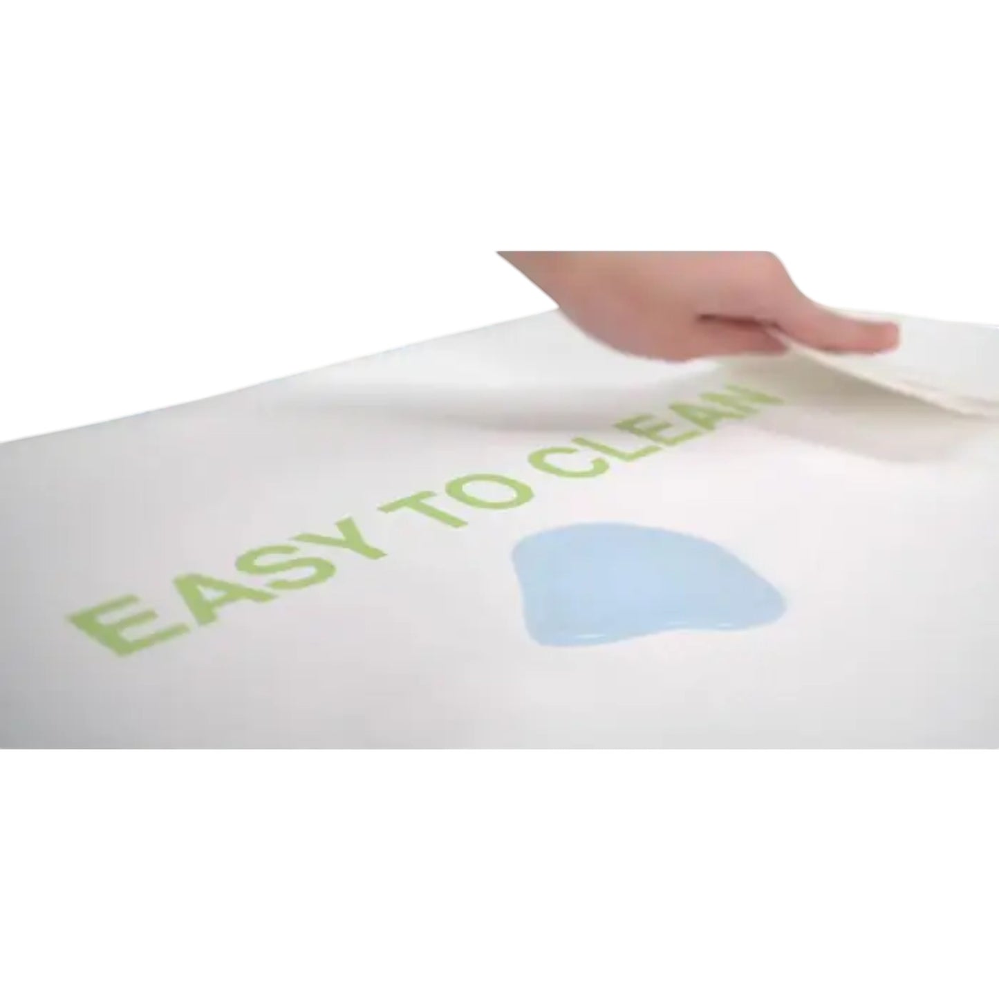 Modugreen Baby Lullaby Earth crib mattress with a waterproof, wipe-clean surface being cleaned by a hand.