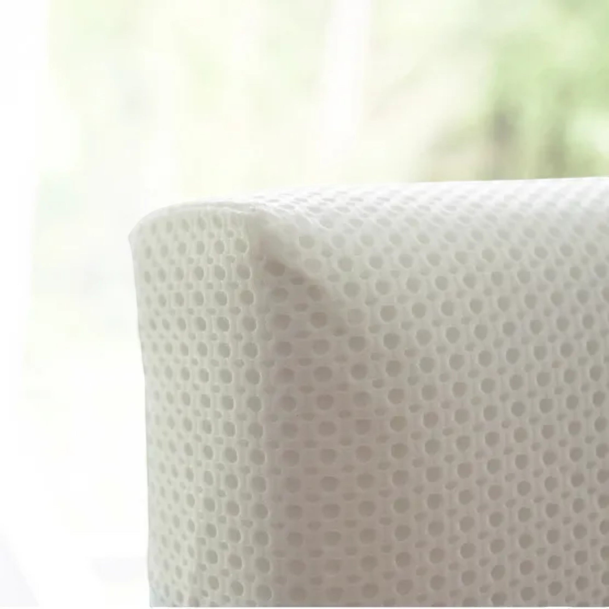 Modugreen Baby Breathe-Safe mini crib mattress featuring a white 3D polyester lattice breathable cover.