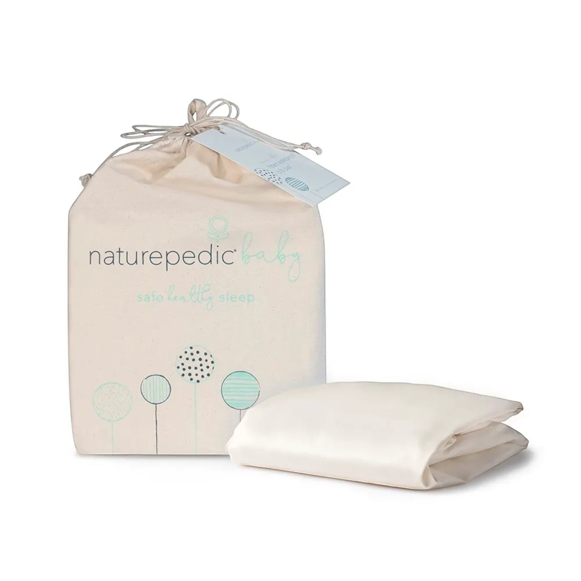 Modugreen Baby organic sateen crib sheet in ivory, folded next to its branded cotton storage bag.